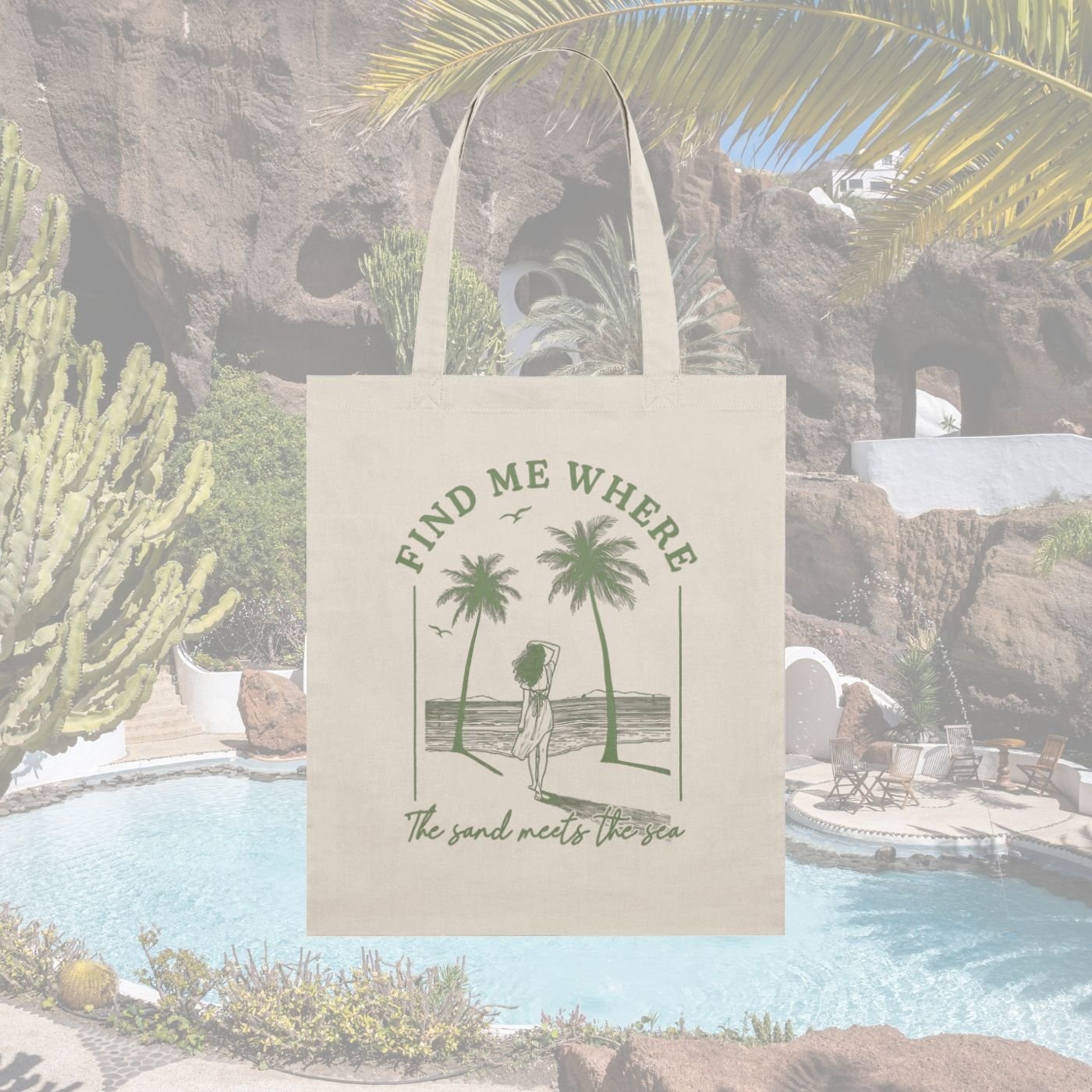 Natural canvas tote printed in green with palm trees, a figure on the shore and the words Find me where the sand meets the sea